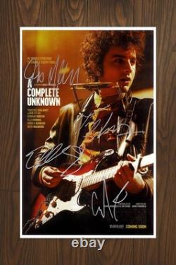 A COMPLETE UNKNOWN Signed Movie Poster 11x17 with COA Authentic Memorabilia
