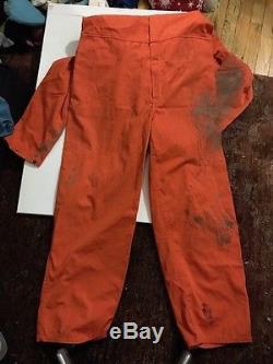 Eric's Donnie Wahlberg Dirty orange coveralls worn in cell in Saw 4 Jigsaw