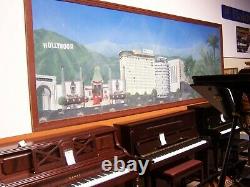 Hollywood Memorabiliia Mural Sixteen Feet Long Framed In Glass