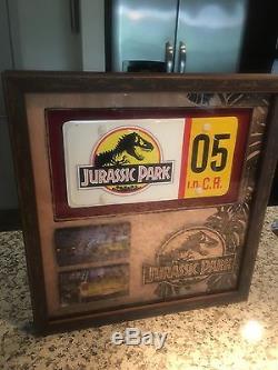 Screen used Jurassic Park prop Ford Explorer license plate COA