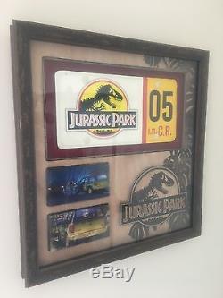 Screen used Jurassic Park prop Ford Explorer license plate COA